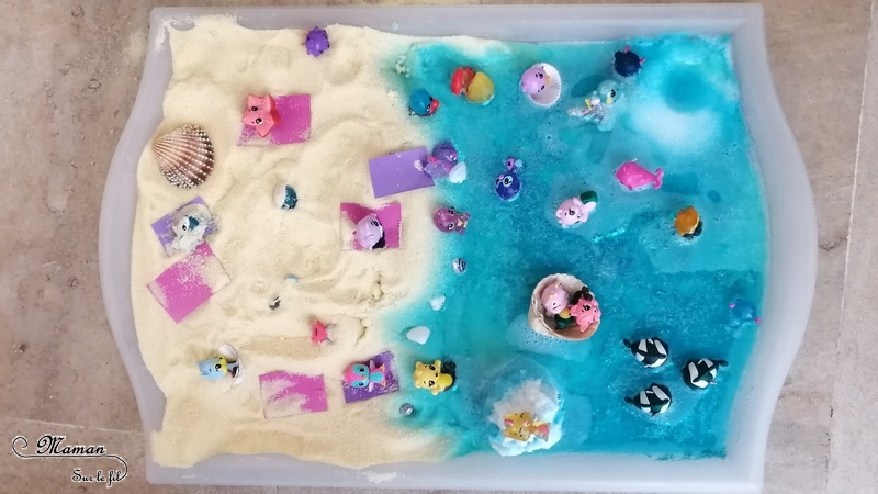 Invitation à jouer : Bac sensoriel Plage Hatchimals - Boules de bain, paillettes et eau - Lagon, tropiques - bulles, brillant, mousse - expérience, vue, odorat - Activité enfants - mslf