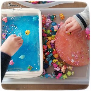 Invitation à jouer : Bac sensoriel Hiver Hatchimals - Glace et glaçons pour créer une patinoire et un toboggan glacé - eau et paillettes - Froid polaire - Activité enfants - mslf