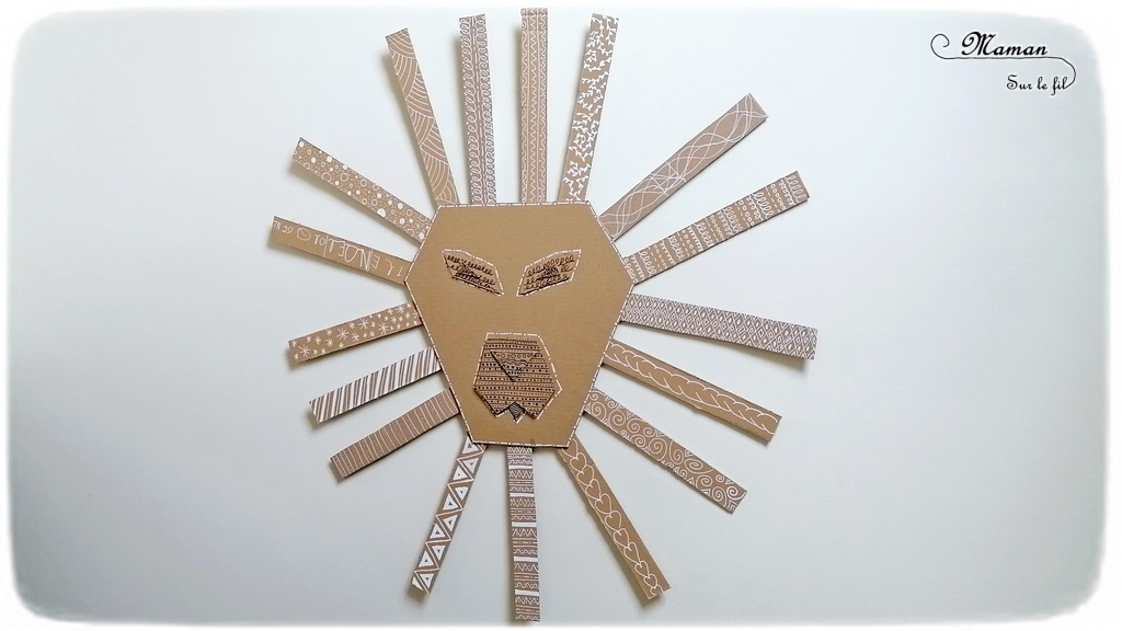 Fabriquer un lion graphique géant en carton - Récup et graphisme - Relief et 3D - Collage - Tête et crinière - Recyclage - Surcyclage - Décoration - Dessin et graphisme - Afrique et Kenya - Animaux de la savane - Découverte d'un pays autour du monde - activité créative et manuelle enfants - Bricolage Eté - Tutoriel - Arts visuels, projet collaboratif maternelle et élémentaire - Cycles 1 et 2 - mslf