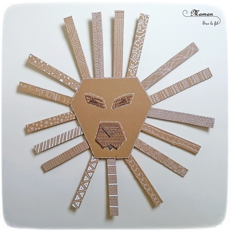 Fabriquer un lion graphique géant en carton - Récup et graphisme - Relief et 3D - Collage - Tête et crinière - Recyclage - Surcyclage - Décoration - Dessin et graphisme - Afrique et Kenya - Animaux de la savane - Découverte d'un pays autour du monde - activité créative et manuelle enfants - Bricolage Eté - Tutoriel - Arts visuels, projet collaboratif maternelle et élémentaire - Cycles 1 et 2 - mslf