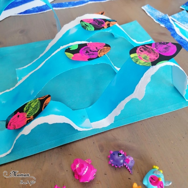 Activité créative et manuelle enfants - Mer, océan et vagues en 3D en papier déchiré et peint à l'encre - Surfs noirs en peinture fluo au bouchon - Surfeurs Hatchimals - Découpage collage - Océan et barrière de corail - Peinture - Créativité - Océanie et Australie - Découverte d'un pays - Espace et géographie - arts visuels et atelier maternelle, Cycle 1, 2 et 3 - Eté - mslf