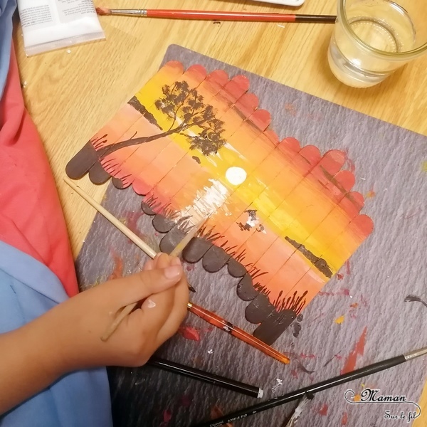 Activité créative et manuelle enfants - activité autonome de ma fille de 11 ans - Peinture sur bâtonnets de glace - Dégradés de couleur pour le coucher de soleil et noir pour les détails - Technique au couteau puis pinceau - Récup' - Arts visuels cycle 3 - peinture - Couleurs chaudes - Thème dauphin, mer, plage été - Découverte d'une technique artistique - Créativité - Océan - mslf