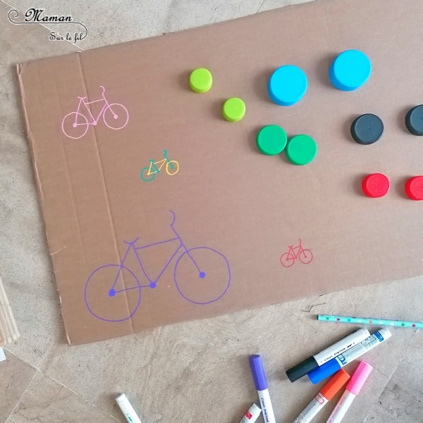 Activité manuelle enfants - Jeu DIY en récup' autour des vélos - Puzzle - Remets les roues au bon endroit en fonction de leur couleur et leur taille - Carton et bouchons de bouteilles - Travail autour des cercles, des couleurs et de la discrimination visuelle - Bricolage géant - Educatif et pédagogique adaptable - Fait maison - recyclage - Créativité - Europe - Pays-Bas, Hollande, Néerlandais - Amsterdam - Découverte d'un pays - Espace et géographie - atelier Cycle 1 ou 2 - Maternelle - mslf