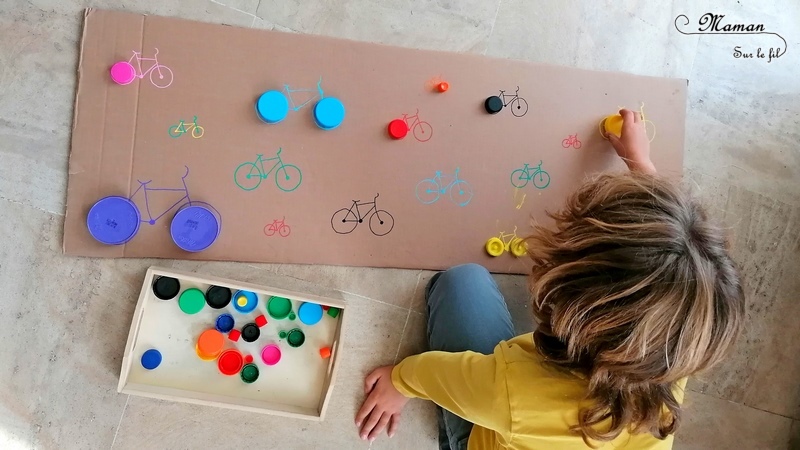 Activité manuelle enfants - Jeu DIY en récup' autour des vélos - Puzzle - Remets les roues au bon endroit en fonction de leur couleur et leur taille - Carton et bouchons de bouteilles - Travail autour des cercles, des couleurs et de la discrimination visuelle - Bricolage géant - Educatif et pédagogique adaptable - Fait maison - recyclage - Créativité - Europe - Pays-Bas, Hollande, Néerlandais - Amsterdam - Découverte d'un pays - Espace et géographie - atelier Cycle 1 ou 2 - Maternelle - mslf