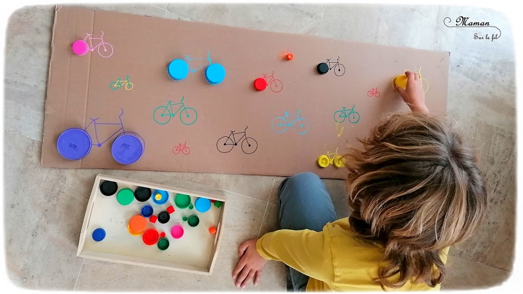 Activité manuelle enfants - Jeu DIY en récup' autour des vélos - Puzzle - Remets les roues au bon endroit en fonction de leur couleur et leur taille - Carton et bouchons de bouteilles - Travail autour des cercles, des couleurs et de la discrimination visuelle - Bricolage géant - Educatif et pédagogique adaptable - Fait maison - recyclage - Créativité - Europe - Pays-Bas, Hollande, Néerlandais - Amsterdam - Découverte d'un pays - Espace et géographie - atelier Cycle 1 ou 2 - Maternelle - mslf