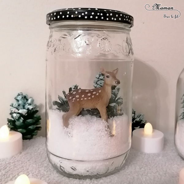 Activité manuelle et créative enfants - Fabriquer des bocaux de Noël ou d'hiver en récup' - Décoration table d'hiver ou de Noël - Fausse neige, sapins enneigés avec pommes de pin, figurines Faon, ours, bonhomme de neige - Animaux de la forêt - Peinture, dessin et nature - Sapins - Décoration fait maison - recyclage - Bricolage et Créativité - arts visuels Cycle 2 ou 3 - Cadeau - Elémentaire ou maternelle avec aide - mslf