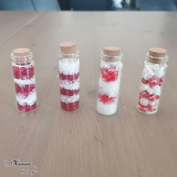 Activité manuelle et créative enfants - Fabriquer des mini-fioles de Noël à suspendre au sapin - façon sucre d'orge en rouge et blanc - Récup, paillettes et matériel créatif divers - Invitation à créer - Décorations fait maison pour le sapin - Décoration de classe - Bricolage et Créativité - arts visuels Maternelle, Cycle 1 ou 2 - Cadeau de fin d'année - Elémentaire ou maternelle - mslf