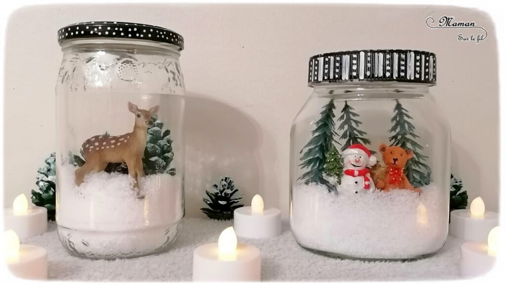 Activité manuelle et créative enfants - Fabriquer des bocaux de Noël ou d'hiver en récup' - Décoration table d'hiver ou de Noël - Fausse neige, sapins enneigés avec pommes de pin, figurines Faon, ours, bonhomme de neige - Animaux de la forêt - Peinture, dessin et nature - Sapins - Décoration fait maison - recyclage - Bricolage et Créativité - arts visuels Cycle 2 ou 3 - Cadeau - Elémentaire ou maternelle avec aide - mslf