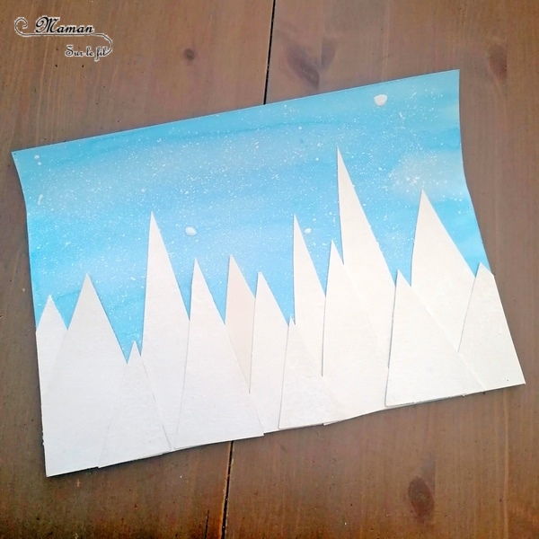 Activité manuelle et créative enfants - Créer une vue de paysage de montagnes enneigées à travers la fenêtre - Neige et Rideaux - En récup' - Carton, emballages, film protecteur - Encre, peinture, découpage, collage - Effet de relief - Neige à la peinture à la brosse à dents - recyclage et surcyclage - Bricolage et Créativité Hiver - arts visuels Elémentaire, maternelle, Cycle 1, 2 - mslf