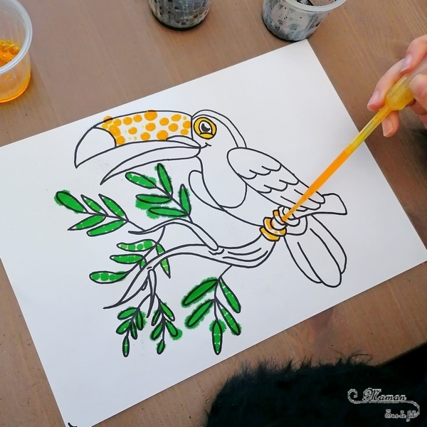 Activité créative enfants - Colorier un toucan avec des pipettes et des gouttes eau colorées - Motricité fine, patience et précision - Pipettes et encre - Pince et préhension doigts - Créativité - Amérique du Sud et Brésil- Découverte d'un pays - Espace et géographie - Animaux de la jungle et oiseaux - arts visuels et atelier maternelle et Cycle 1 et 2 - mslf