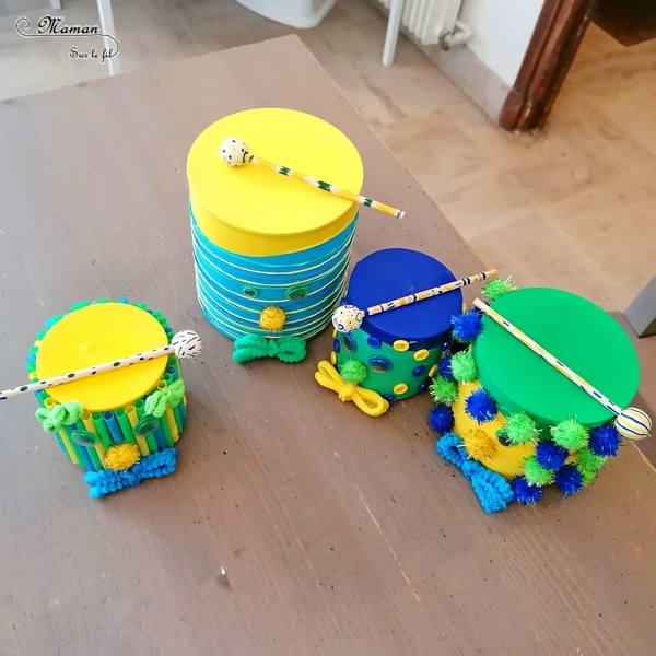 Activité manuelle et créative enfants - Fabriquer une famille de tambours aux couleurs du Brésil - Récup' et recyclage - Pour le carnaval ou mardi-gras - Jeu et bricolage DIY ou activité pour un anniversaire - Fait Maison - Utilisation de boîtes de conserve, de ballons, de pompons, de boutons, de pailles, d'élastiques - C'est la fête - Brésil et Carnaval de Rio - Bricolage DIY et Créativité - arts visuels Elémentaire ou Maternelle, Cycle 1 ou 2 - Découverte d'un pays, géographie - Amérique du Sud - mslf