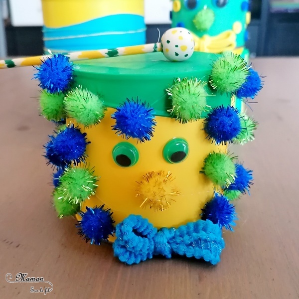 Activité manuelle et créative enfants - Fabriquer une famille de tambours aux couleurs du Brésil - Récup' et recyclage - Pour le carnaval ou mardi-gras - Jeu et bricolage DIY ou activité pour un anniversaire - Fait Maison - Utilisation de boîtes de conserve, de ballons, de pompons, de boutons, de pailles, d'élastiques - C'est la fête - Brésil et Carnaval de Rio - Bricolage DIY et Créativité - arts visuels Elémentaire ou Maternelle, Cycle 1 ou 2 - Découverte d'un pays, géographie - Amérique du Sud - mslf