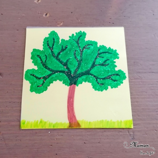 Activité manuelle et créative enfants - Fabriquer un jeu DIY autour des 4 saisons - Arbre modulable et cycle de la nature - Transparents et dessin - changements de l'arbre au fil des saisons - été, automne, printemps et hiver - fleurs, neige, feuilles mortes, soleil - plusieurs étages - couleurs - Bricolage Fait Maison- Feuilles plastiques transparentes - Marqueurs peinture - Bricolage et Créativité - Maternelle - Cycle 1 - Nature et Printemps - mslf