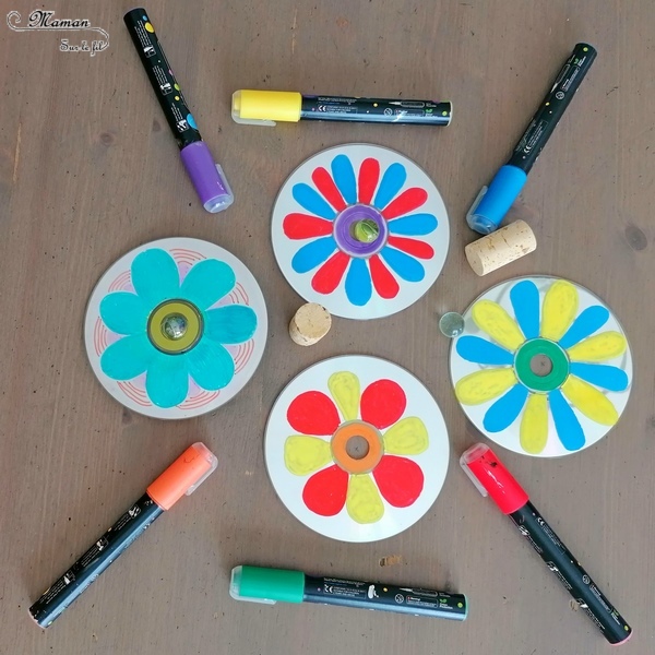 Activité manuelle et créative enfants - Fabriquer des toupies Fleurs DIY - Bricolage et jeu Fait Maison avec de la récup' - Vieux CD Bouchons en liège et billes - Printemps - Mélange des couleurs primaires - Dessin et motricité fine - Marqueurs peinture - Créativité - Maternelle - Cycle 1, 2 - Nature et Printemps - mslf