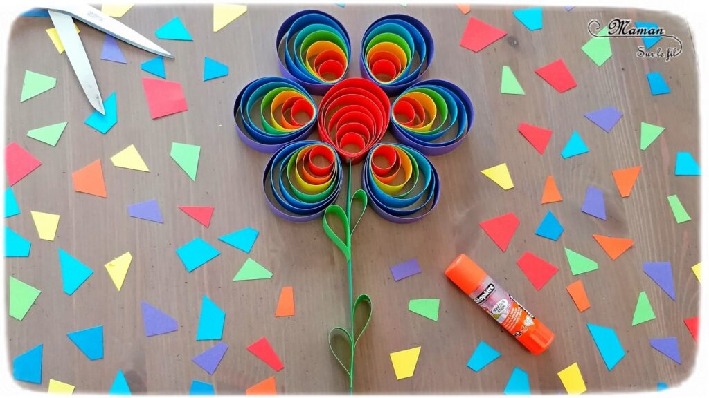 Activité manuelle et créative enfants - Fabriquer une fleur Arc-en-ciel avec des ronds de papier - Cercles et couleurs - Découpage et Collage - Initiation au quilling- Saisons - Printemps et Fleurs - Récup' - Utilisation des chutes de papier - Récup et surcyclage - Bricolage et Créativité - arts visuels Elémentaire, maternelle, Cycle 1, 2 - Nature - mslf