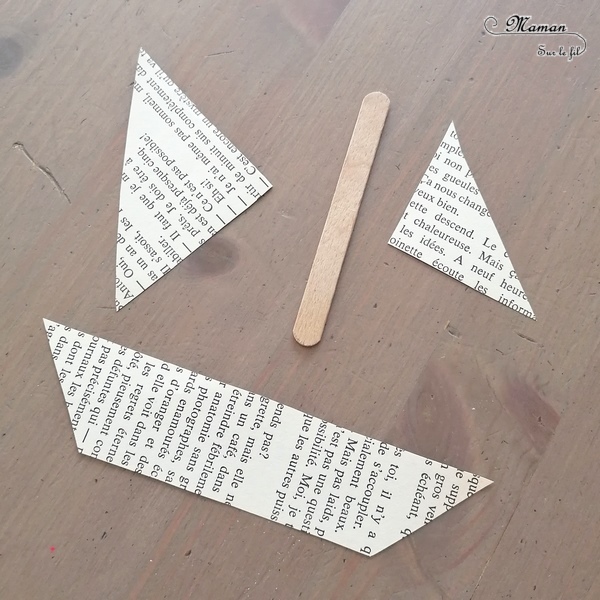 Activité créative et manuelle enfants - Fabriquer un bateau qui navigue sur la mer - Récup', papier déchiré, graphisme - Papier couleur Kraft, récup' de chutes de papier cadeau, bateau avec des pages de livre et un bâtonnet de glace en bois - dessins sur les vagues - navire qui coulisse pour naviguer sur les vagues - Thèmes océans, véhicules, été - Recyclage, surcyclage et Créativité - arts visuels et atelier maternelle et Cycle 1 et 2 - mslf