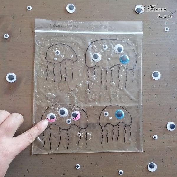 Activité sensorielle, créative et manuelle enfants - Jeu DIY sensoriel - Remets les yeux aux méduses - motricité fine - sac congélation, gel, yeux mobiles - dénombrement - association de couleurs - Dessin - Créativité - arts visuels et atelier maternelle et élémentaire - Cycle 1 ou pré-scolaire - Animaux marins et mer, océans ou été - mslf