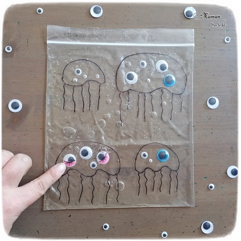 Activité sensorielle, créative et manuelle enfants - Jeu DIY sensoriel - Remets les yeux aux méduses - motricité fine - sac congélation, gel, yeux mobiles - dénombrement - association de couleurs - Dessin - Créativité - arts visuels et atelier maternelle et élémentaire - Cycle 1 ou pré-scolaire - Animaux marins et mer, océans ou été - mslf