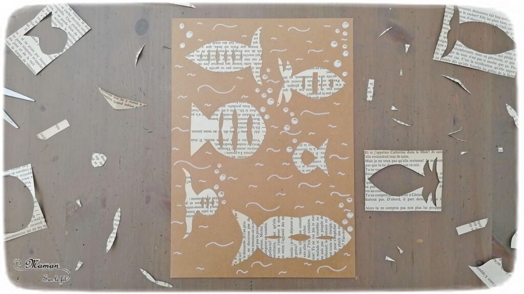 Activité créative et manuelle enfants - Poissons découpés dans une page de livre - Pliage et collage sur une feuille couleur Kraft - Carton - Dessin et Graphisme - Vagues et bulles d'eau blanches - Thèmes animaux marins, océans, mer et poisson d'avril - été - Surcyclage et Créativité - arts visuels et atelier maternelle, Cycle 1 et 2 - mslf