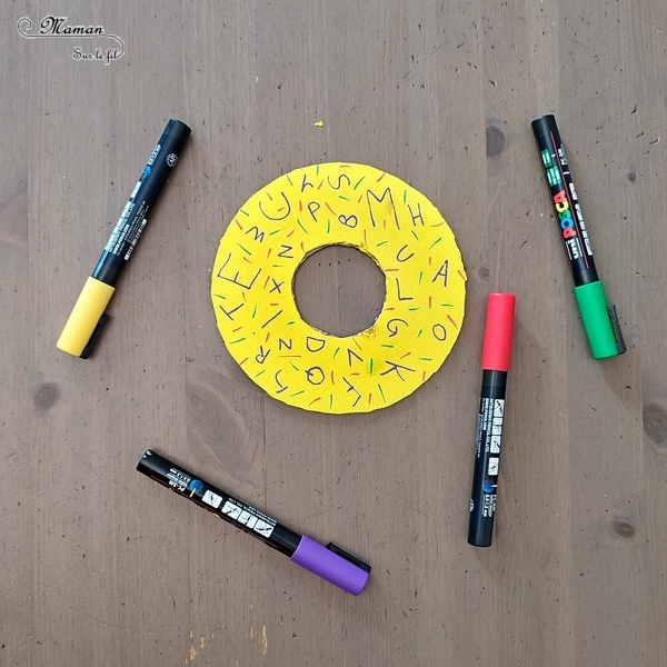 Jeu DIY en récup' - Jeu du donuts Thème école, rentrée et crayons de couleurs - Activité créative et manuelle enfants - Recyclage de carton, peinture et dessin - Jeu d'adresse et de motricité fine - Lettres et Chiffres - Jeu fait maison pédagogique et éducatif - Créativité - arts visuels et atelier maternelle - Cycle 1 et 2 - Atelier autonome - mslf