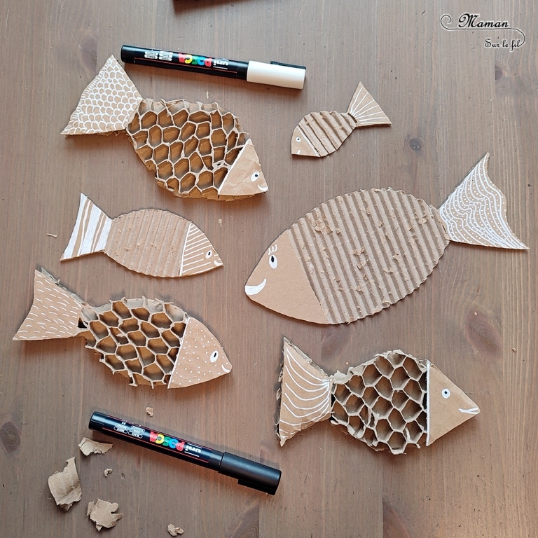 Activité créative et manuelle enfants - Fabriquer des poissons d'avril en carton déchiré - Récup, recyclage, surcyclage - Découpage, déchirage, dessin - A accrocher dans le dos ou en décoration - Bricolage facile et rapide pour le 1er avril; l'été ou un thème sur les animaux marins - Arts visuels Maternelle et élémentaire - Créativité - Cycle 1 ou 2 - tutoriel photos - mslf