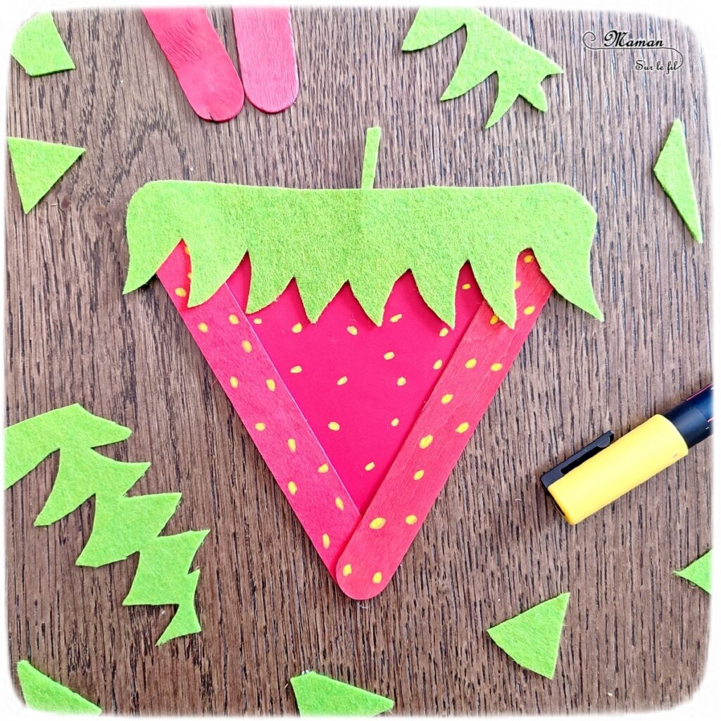 Activité créative, manuelle et récup' enfants - Fabriquer des fraises avec des bâtonnets de glace et de la feutrine - Recyclage et surcyclage de bâtonnets en bois - Peinture, découpage, collage papier et feutrine - Graphismes et points - Fruits d'été - Bricolage facile et rapide pour un thème sur les aliments, les fruits ou l'été - Arts visuels et atelier Maternelle et élémentaire - Créativité - Cycle 1 ou 2 - tutoriel photos - mslf