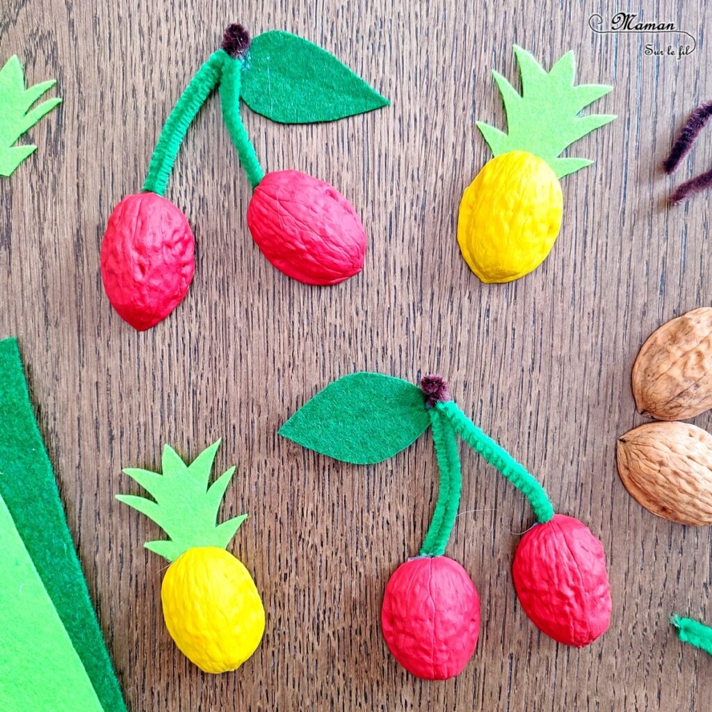 Activité créative, manuelle et récup' enfants - Fabriquer des ananas et des cerises avec des coquilles de noix - Recyclage et surcyclage - Peinture, découpage, collage feutrine et fils chenille - Décoration tropicale - Nature - Fruits d'été et exotiques - Tropiques - Bricolage facile et rapide pour un thème sur les aliments, les fruits ou l'été - Arts visuels et atelier Maternelle et élémentaire - Créativité - Cycle 1 ou 2 - tutoriel photos - mslf