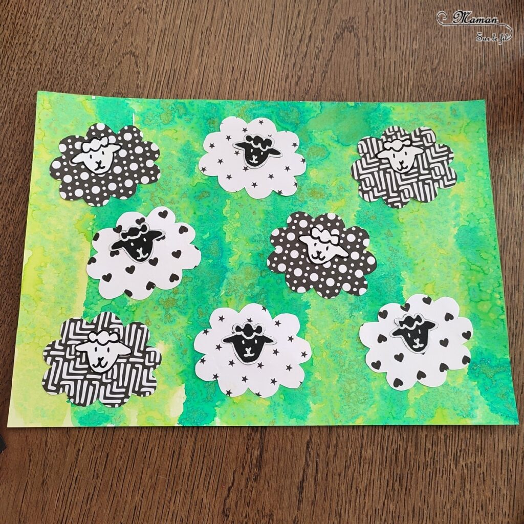 Activité créative et manuelle enfants - Créer des moutons avec des papiers à motifs noirs et blancs - Fond vert type herbe et prairie réalisé avec la technique de l'encre et du gros sel - Lignes verticales -Découpage, collage, dessin - Thèmes Animaux de la ferme ou Pâques - Bricolage facile et rapide - Arts visuels et atelier Maternelle et élémentaire - Créativité - Cycle 1 ou 2 - tutoriel photos - mslf