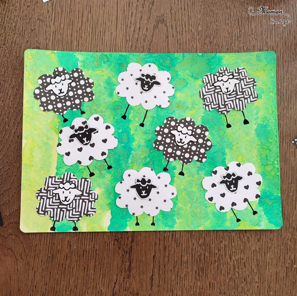 Activité créative et manuelle enfants - Créer des moutons avec des papiers à motifs noirs et blancs - Fond vert type herbe et prairie réalisé avec la technique de l'encre et du gros sel - Lignes verticales -Découpage, collage, dessin - Thèmes Animaux de la ferme ou Pâques - Bricolage facile et rapide - Arts visuels et atelier Maternelle et élémentaire - Créativité - Cycle 1 ou 2 - tutoriel photos - mslf