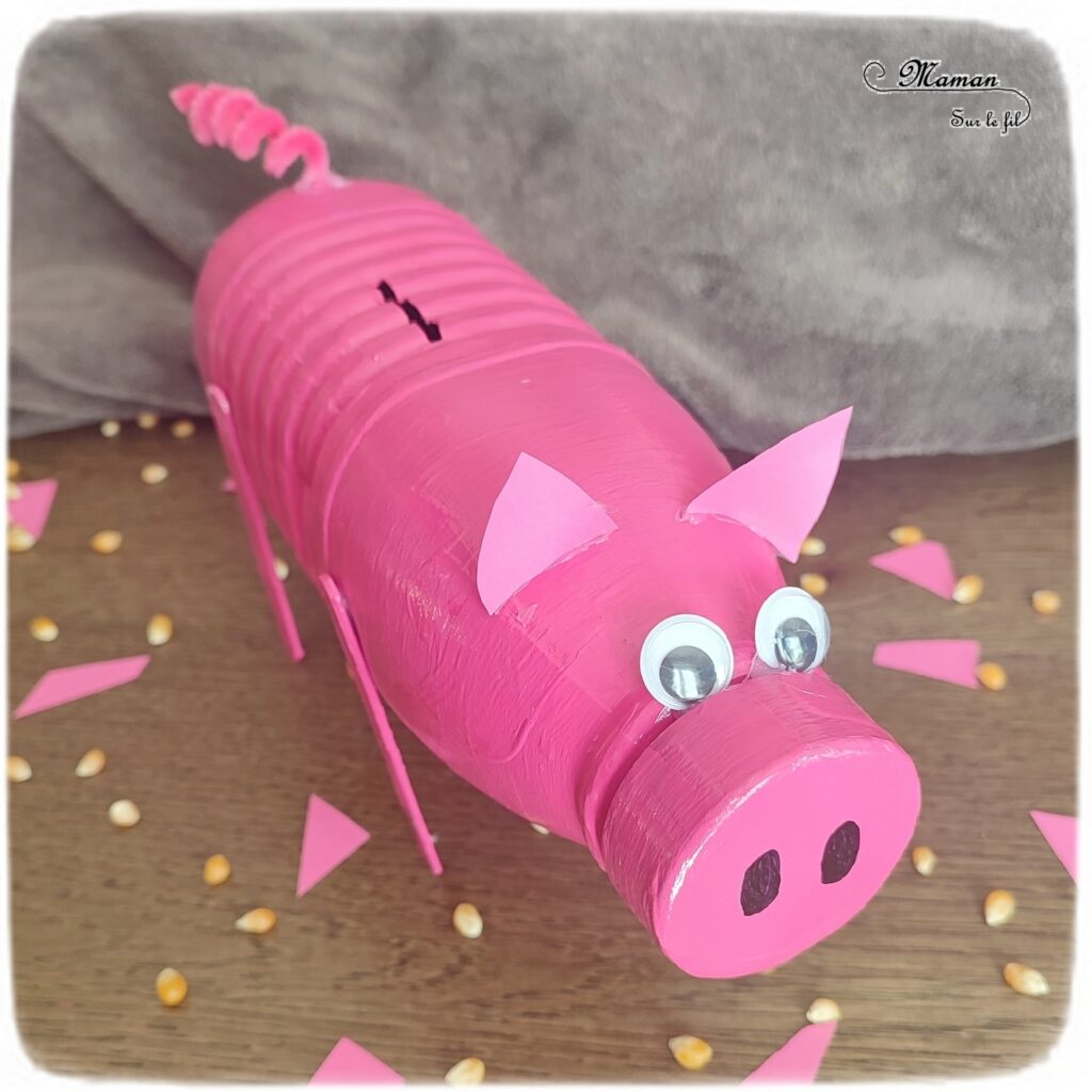 Activité créative et manuelle enfants - Fabriquer un cochon tirelire avec une bouteille de lait - Récup', recyclage, surcyclage - Bâtonnets de glace en bois - Bricolage et Peinture - Bricolage facile et rapide pour un thème sur les animaux de la ferme - Arts visuels et atelier Maternelle et élémentaire - Créativité - Cycle 1 ou 2 - tutoriel photos - mslf