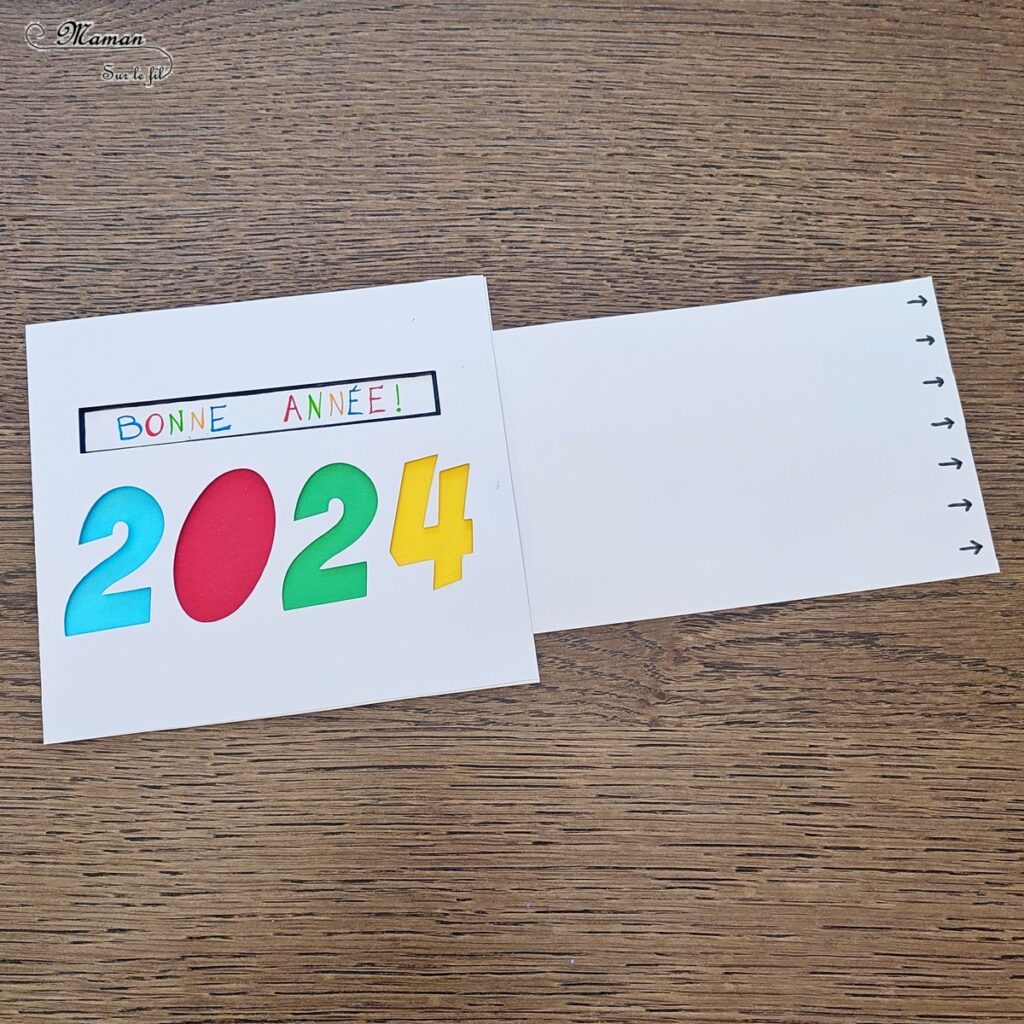 Fabriquer une carte surprise pour fêter la nouvelle année : activité créative et manuelle enfants - Bricolage d'une carte DIY qui se colore et laisse apparaître un message de bonne année quand on tire la languette comme indiqué - Carte de voeux fait maison rigolote et ludique - Découpage et collage - Récup' de chutes de papier coloré - Arts visuels et Bricolage maternelle ou élémentaire (cycles 1, 2 et 3) - Thème Nouvelle année, bonne année, nouvel an - Créativité - tutoriel photos et vidéos - mslf