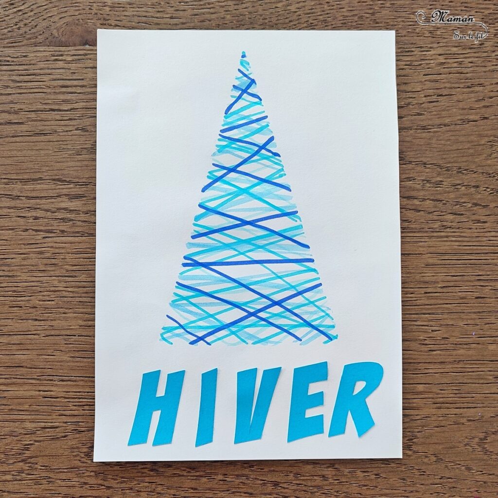 Activité créative et manuelle enfants - Dessiner un sapin hivernal avec des traits de feutres et un pochoir - Dessin, couleurs et nuances de bleu, découpage, collage des lettres du mot hiver - Couleurs hivernales Bleu et blanc - Arts visuels et Bricolage - Thème forêt, arbres, hiver, sapins, Noël - Bricolage et activité facile et rapide - Arts visuels et atelier Maternelle et élémentaire - Créativité - Cycle 1 ou 2 - tutoriel photos et vidéos - mslf