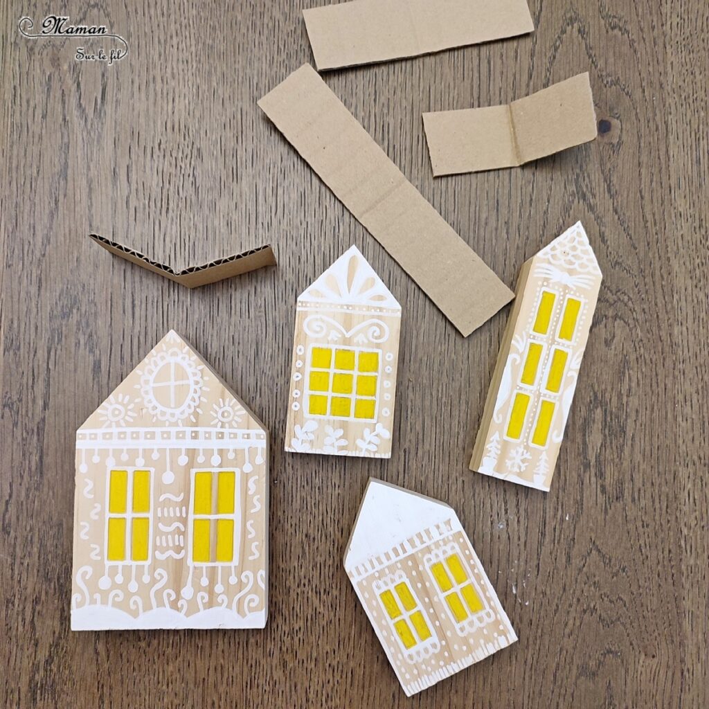 Fabriquer un village d'hiver en bois et récup' : activité créative, récup' et manuelle enfants - Bricolage et décoration facile à faire - Recyclage, surcyclage de carton - Maisons en bois avec toit enneigé en carton - Découpage, collage, fausse neige - Dessins et graphismes blancs - Bricolage sympa pour une décoration hivernale - Arts visuels et Bricolage - Thème hiver, neige, nuit - Arts visuels et atelier Maternelle et élémentaire - Créativité - Cycle 1 ou 2 - tutoriel photos - mslf