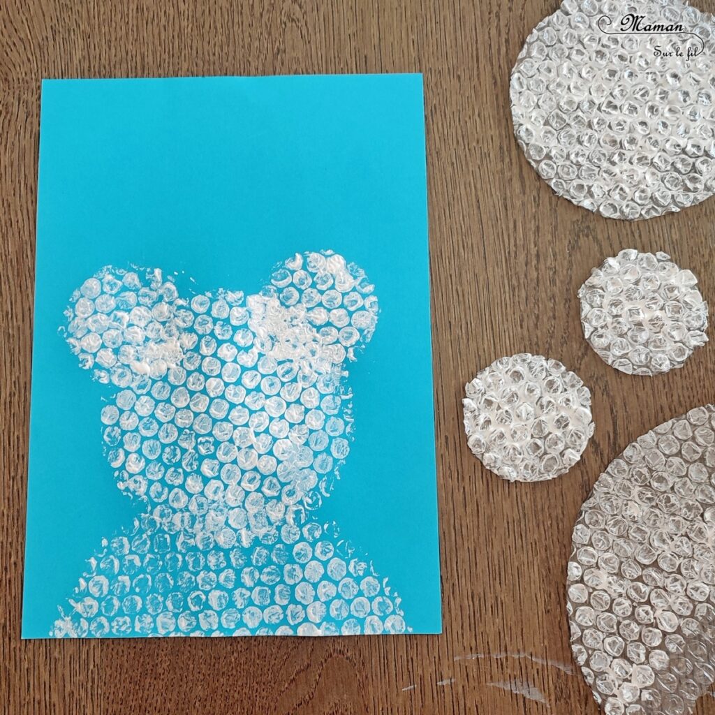 Peindre un ours polaire avec du papier à bulles : activité créative, récup' et manuelle enfants - Technique de Peinture rigolote - Découpage et collage - Récup' d'une enveloppe couleur Kraft et carton - Yeux mobiles, dessin et graphismes - Bricolage sympa pour une décoration hivernale - Surcyclage et recyclage - Arts visuels et Bricolage - Thème hiver, animaux de la banquise et du froid - Bricolage facile et rapide - Arts visuels et atelier Maternelle et élémentaire - Créativité - Cycle 1 ou 2 - tutoriel photos - mslf