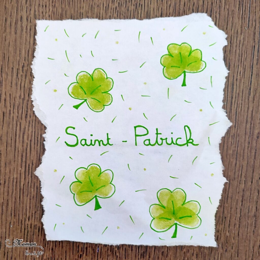 Créer une carte Trèfles de la Saint-Patrick en empreintes de doigts : activité créative et manuelle enfants - Empreintes de doigts faites avec de l'encre pour tampons - 3 formes de coeur pour créer le trèfle - Dessin et écriture - Cadre en papier déchiré - Arts visuels et Bricolage - Thème Trèfles, Saint-Patrick, Irlande, Géographie, autour du monde - Découverte d'un pays - Bricolage facile et rapide - Arts visuels et atelier Maternelle et élémentaire - Créativité - Cycle 1 ou 2 - tutoriel photos - mslf