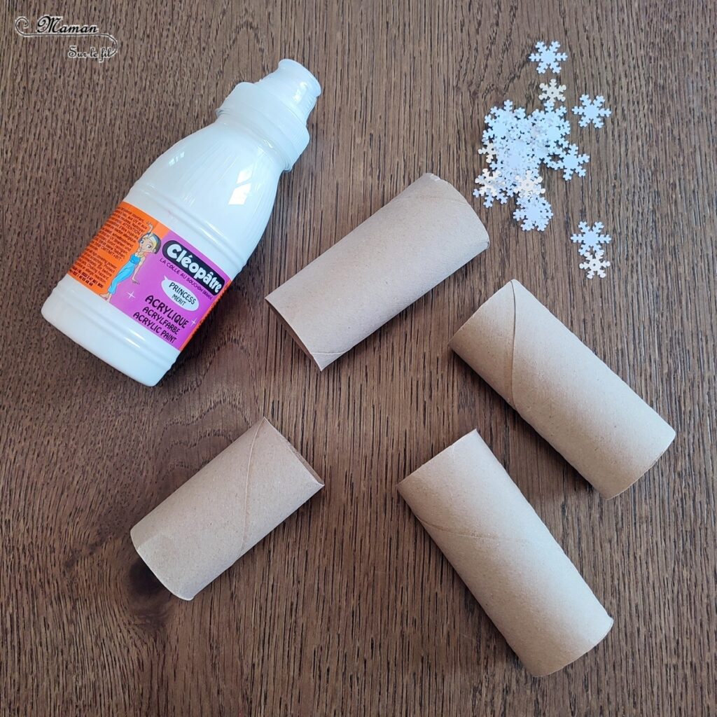 Fabriquer des lapins polaires en récup' : activité créative, récup' et manuelle enfants - Lièvres arctiques avec rouleaux de papier toilette, peinture et couronne de flocons - Entre deux thèmes : hiver et Pâques - Rouleau de PQ, découpage, collage, dessin - Recyclage, surcyclage - Bricolage sympa pour une décoration hivernale - Arts visuels et Bricolage - Thème hiver, animaux de la banquise et du froid, de la ferme, de la campagne, Pâques - Bricolage facile et rapide - Arts visuels et atelier Maternelle et élémentaire - Créativité - Cycle 1 ou 2 - tutoriel photos - mslf
