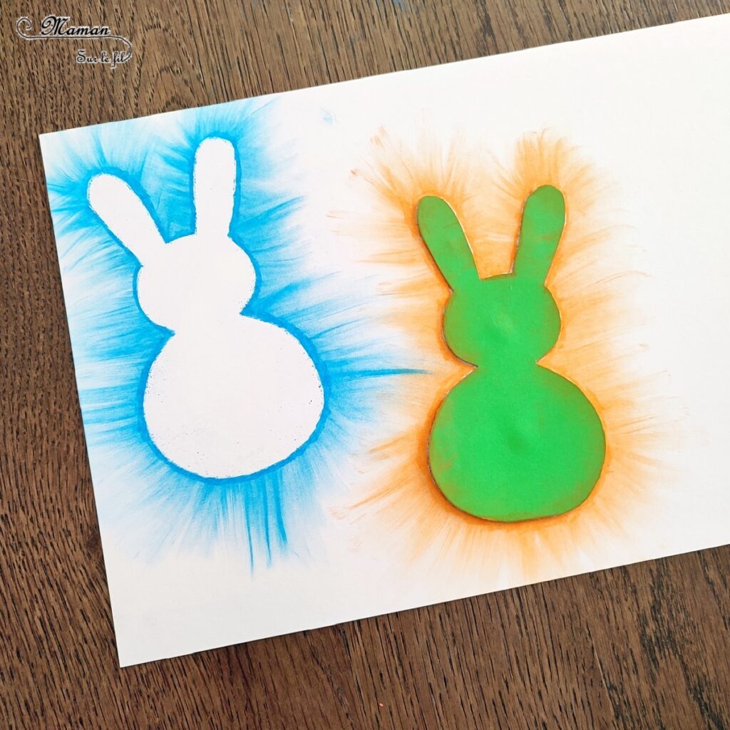 Créer des lapins de Pâques aux pastels étalés : activité créative et manuelle enfants - Technique des pastels étalés au doigt pour un effet lumineux - Pompons pour la queue et le côté mignon - Récup' de chutes de papier pour les pochoirs - Graphismes, découpage, collage - Arts visuels et Bricolage - Thème Pâques et animaux de la ferme - Bricolage facile et rapide - Arts visuels et atelier Maternelle et élémentaire - Créativité - Cycle 1 ou 2 - tutoriel photos - mslf