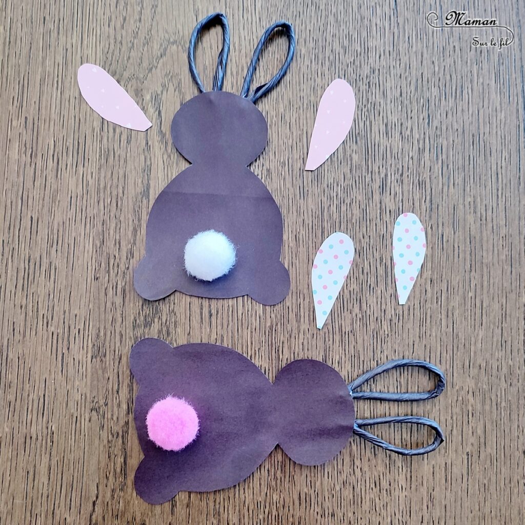 Fabriquer des lapins Récup' avec un sac en papier : activité créative, récup' et manuelle enfants - Sac marron type Kraft en papier cartonné - Corps des lapins découpés dans le sac, oreilles faites avec poignées - Découpage collage de papier et pompons pour la queue - Recyclage, surcyclage - Bricolage sympa et simple - Arts visuels et Bricolage - Thème Pâques, animaux de la ferme, de la campagne - Bricolage facile et rapide - Arts visuels et atelier Maternelle et élémentaire - Créativité - Cycle 1 ou 2 - tutoriel photos - mslf