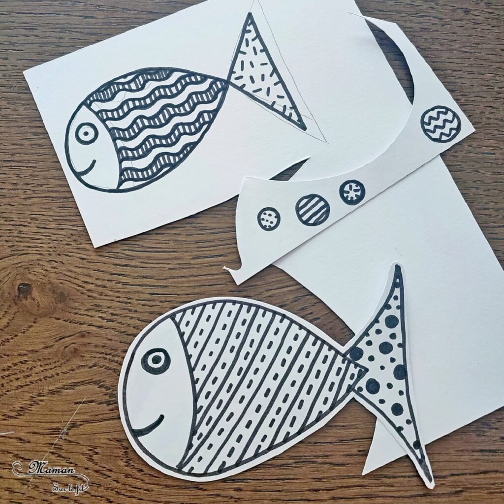 Créer des poissons graphiques sur fond bleu : activité créative et manuelle enfants - Découpage en vagues et collage de papiers bleus pour le fond - Dessin et graphismes en noir pour les poissons - Contraste entre les couleurs vives du fond et le noir et blanc des poissons - Arts visuels et Bricolage - Thème Poissons d'avril, animaux marins, 1er avril, été - Bricolage facile et rapide - Arts visuels et atelier Maternelle et élémentaire - Créativité - Cycle 1 ou 2 - tutoriel photos - mslf