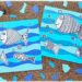 Créer des poissons graphiques sur fond bleu : activité créative et manuelle enfants - Découpage en vagues et collage de papiers bleus pour le fond - Dessin et graphismes en noir pour les poissons - Contraste entre les couleurs vives du fond et le noir et blanc des poissons - Arts visuels et Bricolage - Thème Poissons d'avril, animaux marins, 1er avril, été - Bricolage facile et rapide - Arts visuels et atelier Maternelle et élémentaire - Créativité - Cycle 1 ou 2 - tutoriel photos - mslf