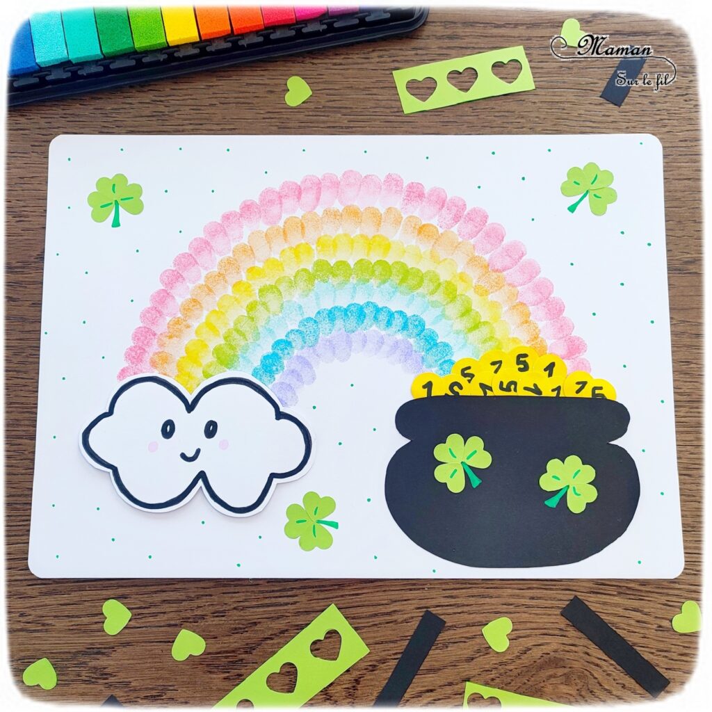 Créer un arc-en-ciel de la Saint-Patrick en empreintes de doigts : activité créative et manuelle enfants - Empreintes de doigts faites avec de l'encre pour tampons - 3 formes de coeur à la perforatrice pour créer les trèfles - Découpage, collage - Dessin et écriture - Chaudron, trésor, pièces, nuages - Arts visuels et Bricolage - Thème Trèfles, Saint-Patrick, Irlande, Géographie, autour du monde - Découverte d'un pays - Bricolage facile et rapide - Arts visuels et atelier Maternelle et élémentaire - Créativité - Cycle 1 ou 2 - tutoriel photos - mslf