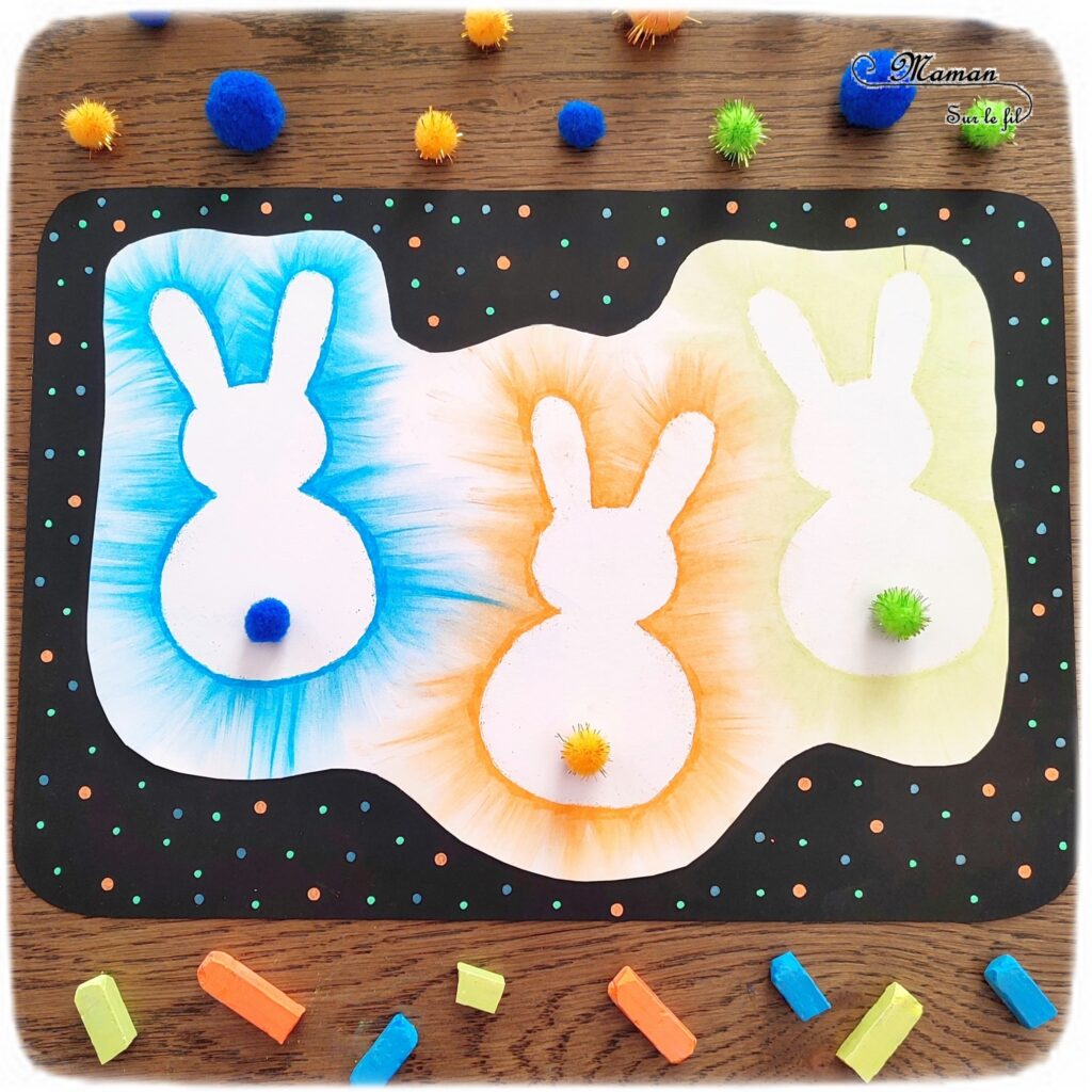 Créer des lapins de Pâques aux pastels étalés : activité créative et manuelle enfants - Technique des pastels étalés au doigt pour un effet lumineux - Pompons pour la queue et le côté mignon - Récup' de chutes de papier pour les pochoirs - Graphismes, découpage, collage - Arts visuels et Bricolage - Thème Pâques et animaux de la ferme - Bricolage facile et rapide - Arts visuels et atelier Maternelle et élémentaire - Créativité - Cycle 1 ou 2 - tutoriel photos - mslf