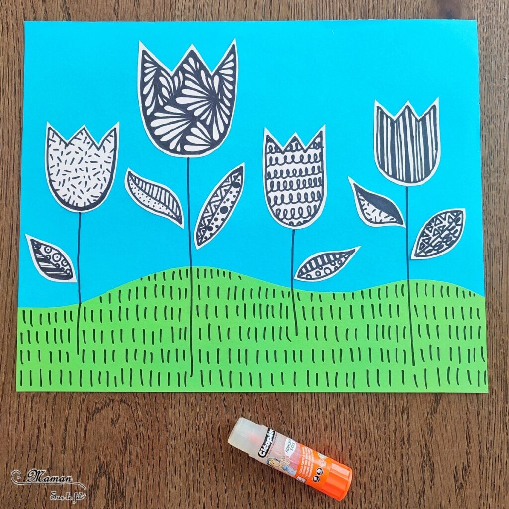 Dessiner des tulipes graphiques sur fond coloré : activité créative et manuelle enfants - Découpage en vagues et collage de papiers colorés pour le fond - Dessin et graphismes en noir pour les tulipes et les feuilles - Contraste entre les couleurs vives du fond et le noir et blanc des fleurs - Arts visuels et Bricolage - Thème printemps, fleurs, géographie, Pays-Bas - Bricolage facile et rapide - Arts visuels et atelier Maternelle et élémentaire - Créativité - Cycle 1 ou 2 - tutoriel photos - mslf