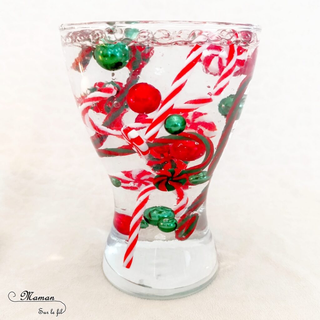 Décoration DIY de Noël : les vases magiques avec des perles d'eau : activité créative et manuelle enfants - Décoration faite maison facile - Vases et bougies aux couleurs de Noël, façon sucres d'orge - Perles d'eau, figurines en résine, eau, bougies flottantes - Bricolage facile, magique, rapide et rigolo - Expériences - Thème Noël - Bricolage et décoration sympa et facile - Arts visuels Maternelle et cycle 2 - Maternelle et élémentaire - Créativité - Cycle 1 ou 2 - tutoriel photos et vidéo - mslf