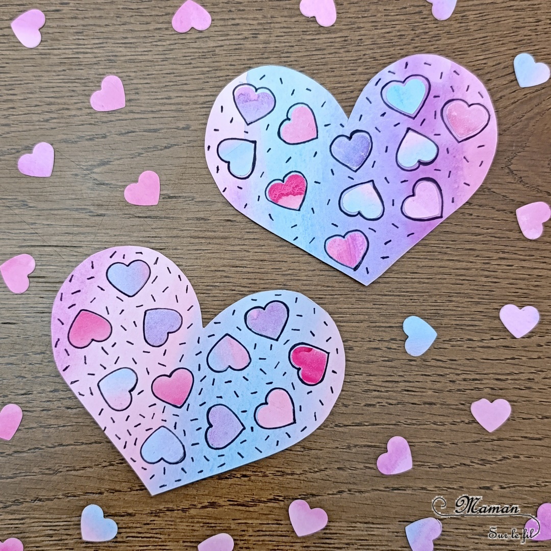 Coeurs sur coeurs en peinture et dessin : activité créative et manuelle enfants - Fond réalisé avec des bandes à la peinture type aquarelle - Découpage et perforatrice Mini Coeurs - Collage, dessin et graphismes - Couleurs aquarelles et contraste avec le stylo feutre noir - Carte, cadeau à offrir pour la Saint Valentin ou la fête des mères, pères, grands-mères, grands-pères... - Thème Amour, amitié, coeurs, Saint Valentin, fêtes - Bricolage et décoration sympa et facile - Arts visuels Maternelle et cycle 2 - Maternelle et élémentaire - Créativité - Cycle 1 ou 2 - tutoriel photos - mslf