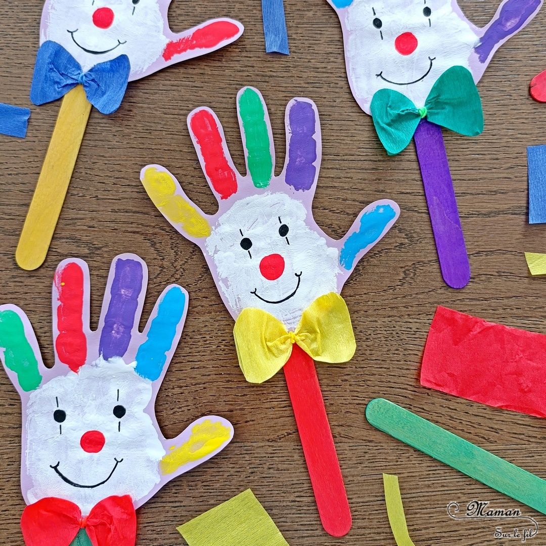 Peindre des clowns avec des empreintes de main : activité créative, peinture et manuelle enfants - Empreintes de main colorées - Découpage, dessin, couleurs - Noeuds papillon avec du papier crépon et un élastique - Marionnettes avec des bâtonnets en bois colorés - Bricolage ludique et coloré pour un thème Anniversaire, Carnaval, Mardi Gras ou Cirque - Bricolage et décoration sympa et facile - Arts visuels Maternelle et cycle 2 - Maternelle et élémentaire - Créativité - Cycle 1 ou 2 - tutoriel photos - mslf