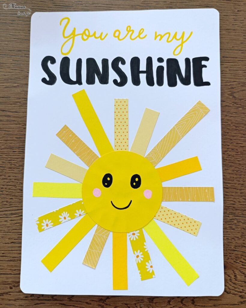 Créer une carte DIY You are my sunshine : activité créative et manuelle enfants - Soleil en bandes de papiers divers - Utilisation de chutes de papier - Géométrie, utilisation de la règle et du compas - Découpage et collage - Calligraphie - Carte à offrir à ceux qu'on aime - Cadeau fait maison - Thème météo, ciel, soleil, été, fête des mères, pères, parents - Bricolage et décoration sympa et facile - Arts visuels maternelle et élémentaire - Cycles 1 et 2 - Créativité - tutoriel photos - mslf