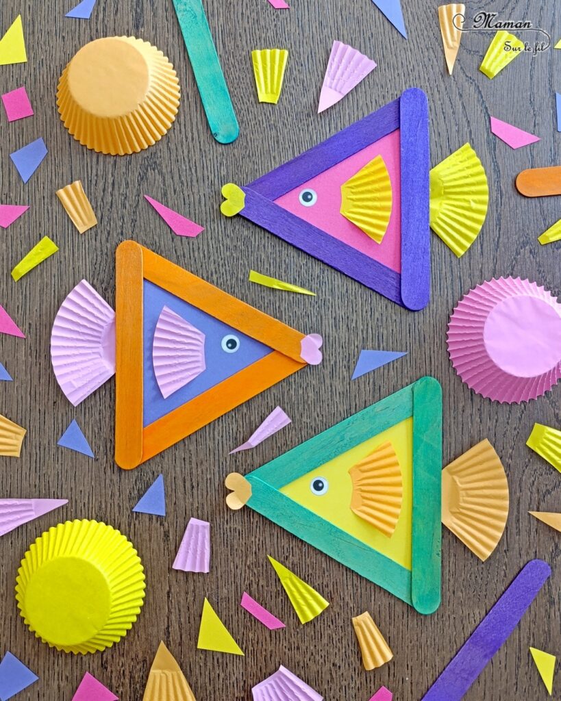 Fabriquer des poissons colorés avec des bâtonnets de bois et des caissettes à cupcakes : activité créative, récup' et manuelle enfants - Recyclage et surcyclage de gros bâtonnets en bois colorés et de caissettes couleurs Arc-en-ciel - Bricolage facile et rigolo - Découpage, collage - Gommettes Yeux - Thème poissons, animaux marins, mer, océans, été, 1er avril - Bricolage et décoration sympa et facile - Arts visuels maternelle et élémentaire - Cycles 1 et 2 - Créativité - tutoriel photos - mslf