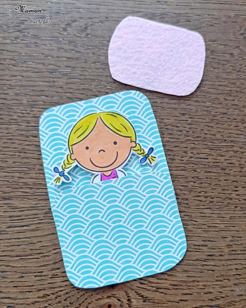 Fabriquer des enfants dans leur duvet, allongés autour d'un min feu de camp : activité créative, coloriage et manuelle enfants - Bricolage facile pour jeu d'imagination et d'imitation DIY - Coloriage aux feutres, découpage, collage - Récup' de carton - Papiers à motifs type scrapbooking, feutrine - Mini feu de camp avec petites branches et laine - Campement avec avec feu de camp - Nuit à la belle étoile en colonie - Thème camping, vacances, été, colonies, camp d'été - Bricolage et décoration sympa et facile - Arts visuels maternelle et élémentaire - Cycles 1 et 2 - Créativité - tutoriel photos - mslf