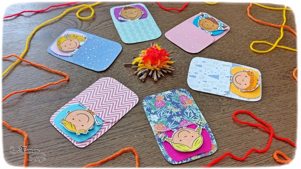 Fabriquer des enfants dans leur duvet, allongés autour d'un min feu de camp : activité créative, coloriage et manuelle enfants - Bricolage facile pour jeu d'imagination et d'imitation DIY - Coloriage aux feutres, découpage, collage - Récup' de carton - Papiers à motifs type scrapbooking, feutrine - Mini feu de camp avec petites branches et laine - Campement avec avec feu de camp - Nuit à la belle étoile en colonie - Thème camping, vacances, été, colonies, camp d'été - Bricolage et décoration sympa et facile - Arts visuels maternelle et élémentaire - Cycles 1 et 2 - Créativité - tutoriel photos - mslf